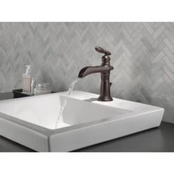 Delta Victorian Venetian Bronze 1-handle Single Hole/4-in Centerset WaterSense Bathroom Sink Faucet With Drain