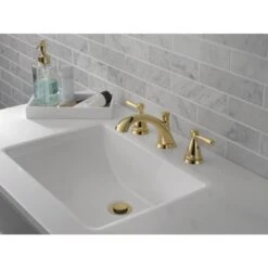 Delta Bayside Polished Brass 2-handle Widespread WaterSense Bathroom Sink Faucet With Drain 9 Delta Bayside Polished Brass 2-handle Widespread WaterSense Bathroom Sink Faucet With Drain -Valpar Bathroom Shop 034449837972 10576762 1800x1800