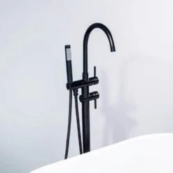 2-Handle Floor-Mount Roman Tub Faucet With Hand Shower In Matte Black -Valpar Bathroom Shop 9370803581d7a297192132bc8bd4e943 1800x1800