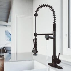 Zurich Single-Handle Pull-Down Sprayer Kitchen Faucet With Deck Plate In Matte Black 18 Zurich Single-Handle Pull-Down Sprayer Kitchen Faucet With Deck Plate In Matte Black -Valpar Bathroom Shop e70fe6a9f0b1634523aa8fb8f51f4f28 1800x1800